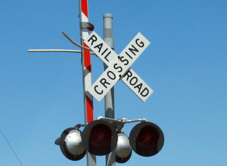 Railroad crossing crossbucks, Photo by Bobbsled
