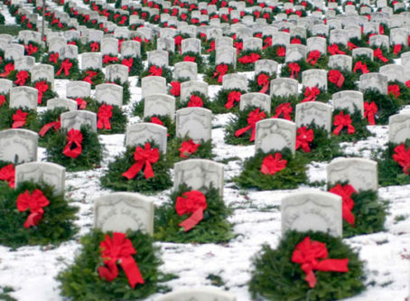 Wreaths on tombstones. Courtesy National Wreaths Across America Day