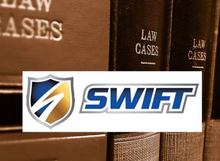 Swift logo, law books