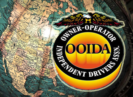 OOIDA logo over globe showing Canada, United States and Mexico