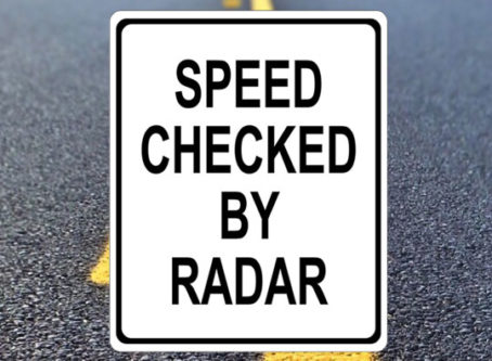 Speed checked by radar sign