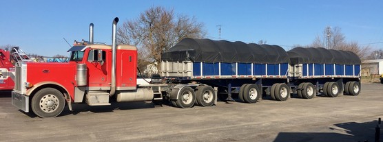 Overweight truck pulling double trailers