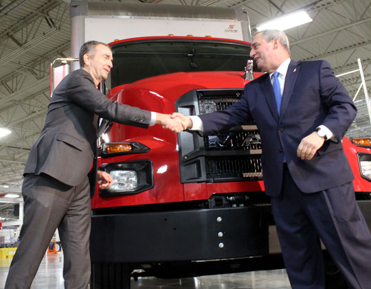 Gov. Ralph Northam, Mack Trucks President Martin Weissburg, new MD Series Mack truck