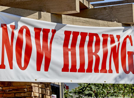 Employment numbers, We're Hiring sign