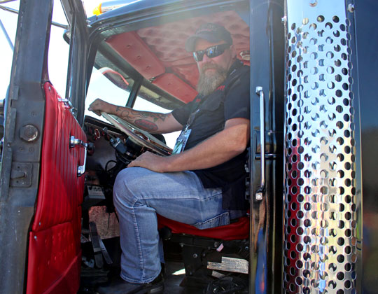 Nate Lawrence in the cab of his "Maximum Overdrive" replica truck