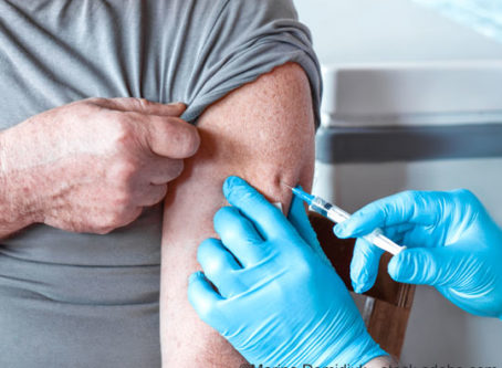Man getting vaccinated for COVID-19