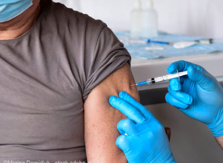 Man getting COVID-19 vaccination
