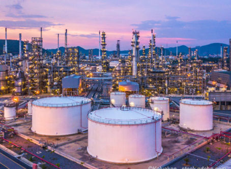 Aerial view oil and gas chemical tank with oil refinery plant background