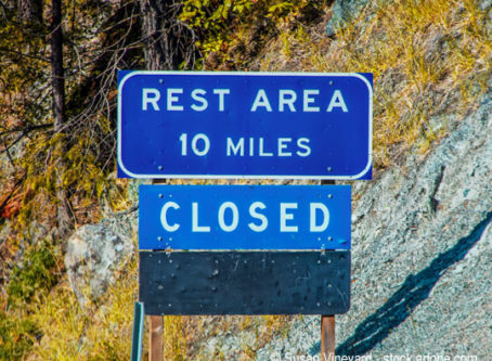 Rest Area sign with Closed posted below it. Photo by Susan Vineyard.