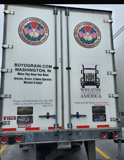 The back of OOIDA life member Don Crouse's Wreaths Across America festooned trailer (Photo by Marty Ellis)