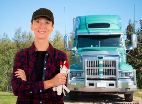 Woman truck driver with her truck. Image by katy_89