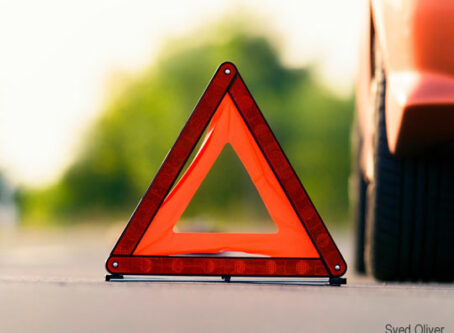 Emergency triangle on highway. Photo by Sved Oliver