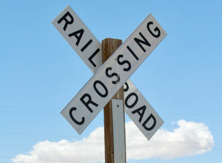 Railroad crossing crossbucks, photo by nightowl