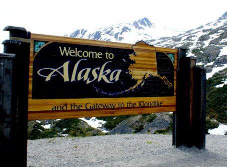 Welcome to Alaska sign on the Yukon Highway. Photo by Richard Martin