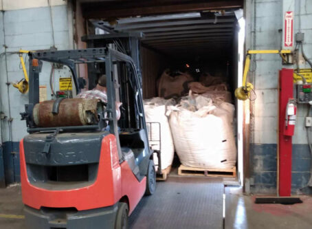 Loading hemp for shipment. Photo courtesy 357 Hemp Logistics