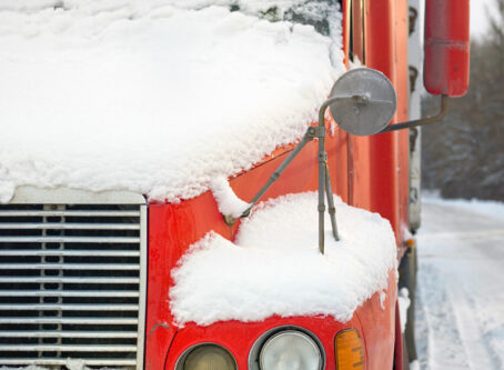 Snow and ice on commercial truck. Image by Vectorass