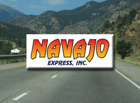 Navaho Express logo, I-70 and Rockies background photo by Ken Lund