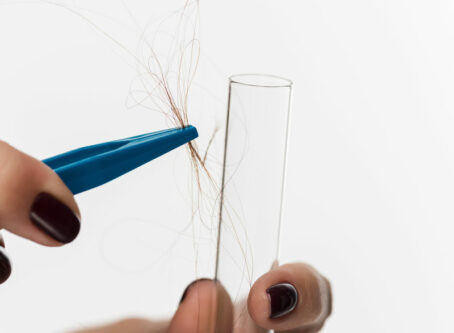 Hair testing sample, test tube. Image by Lightfield Studios