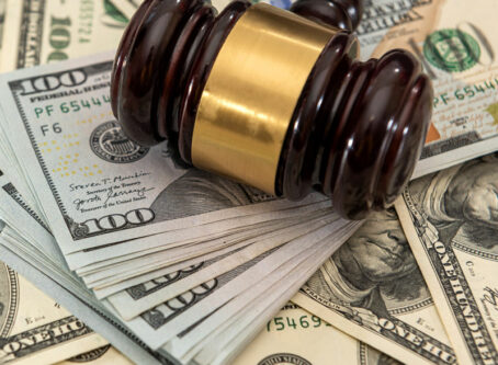 Judge's gavel, money. Image by RomanR