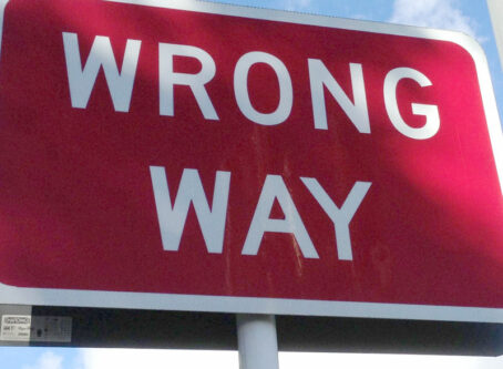 Wrong way highway sign