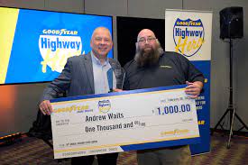 Andrew Waits (right) was named the 2022 Goodyear Highway Hero 