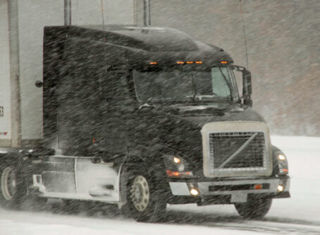 Semitruck winter driving Photo by imageegami